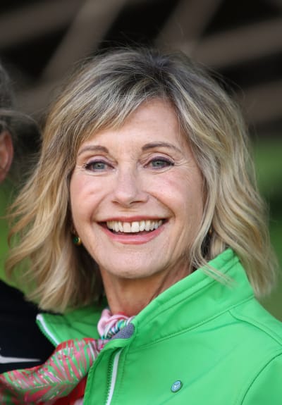 Olivia Newton-John speaks on stage during the annual Wellness Walk and Research Runon